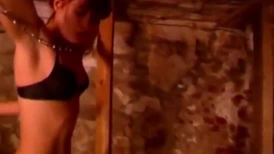 Lingerie-clad lesbian sex slave enjoys being spanked