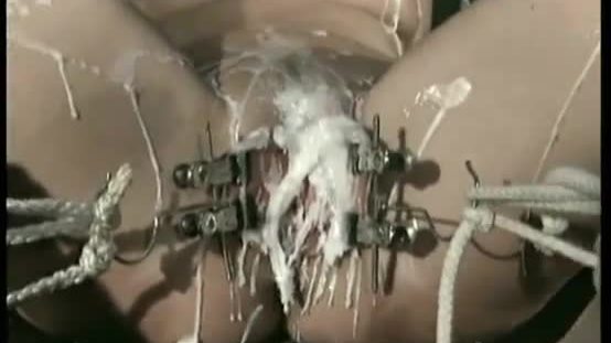Beautiful slave gets her tits and wide speade pussy covered with hot candlewax by master